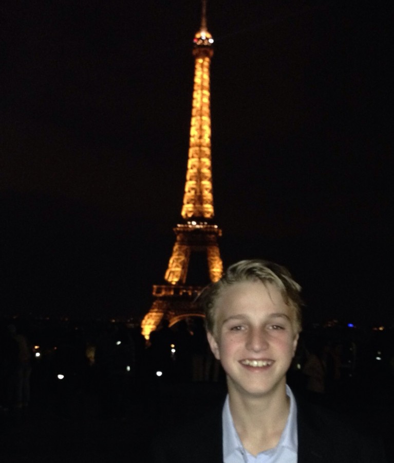 Sam Judd, freshman, poses in front of the Eiffel Tower during his trip to Europe. He enjoyed his trip and hopes to return someday soon. Exploring Europe was a great experience, Judd said. 