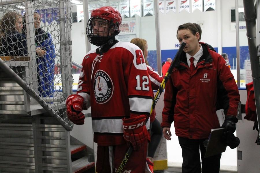 Alex Puhl, senior, walks off the ice after a recent victory. Puhl has played all four years at Homestead and has aided in the team’s success this year. “Our chemistry seems to be a lot higher this year than other years,” Puhl stated.