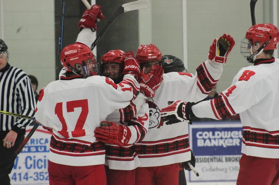 A+host+of+Highlanders+celebrate+after+Jake+Elcherts+goal+in+the+second+period+of+last+nights+game.