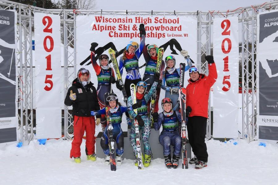 The girls varsity ski team poses after the state meet.