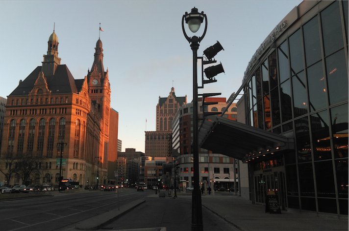A warm ray of sun illuminates a building downtown on Water Street.