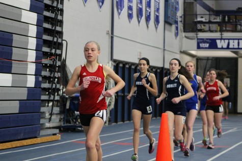 Zanelle Willemse, freshman, runs to a first place finish in the two mile.