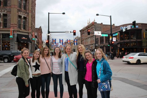 Highlander Publication staffers, Anna Kreynin, Bella Stechschulte, Molly Riebau, Elizabeth Huskin, Sydney Roeper, Katya Mikhailenko, Nicole Martin, and Emily Hannemann all pose for a picture during a night on the town. The team traveled to Denver, CO for the Spring National High School Journalism Convention. "Spending time with other staff members outside the classroom really helped us all become closer," Martin said.