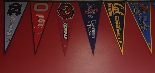 The flags of many different colleges are a new addition to the hallways at Homestead in the past week. “They look nice and they encourage to students to go to college,” Mr. Tony Navarre, special education teacher, said.
