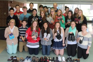 Mrs. Rachel Rauch's third hour Honors English 9 class  donated 55 pairs of shoes to benefit their classmate's service project. 