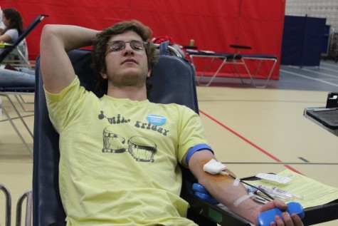 Bartlett relaxes while donating blood at the Student Council event.