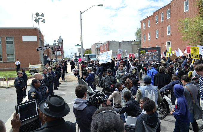 Protesters demonstrate at the Baltimore Police Departments Western District building.