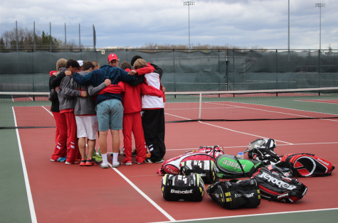 The Homestead team huddles up before the match against North shore conference team, Germantown.