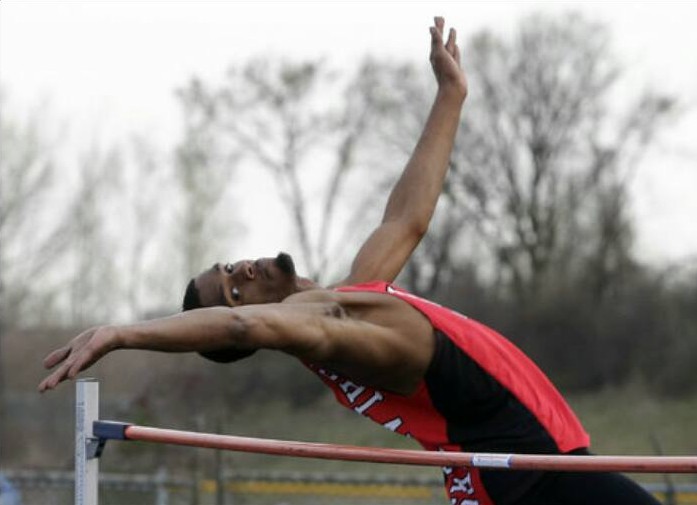 Triggs executes a routine high jump during a meet this past fall. His season ended at sectionals after a fourth place finish.