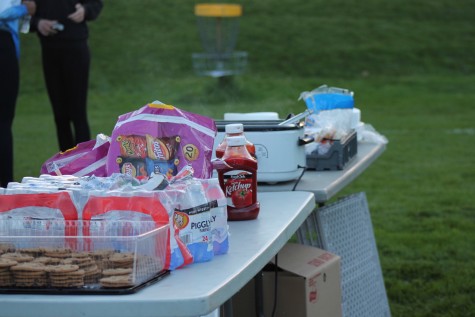 Cookies, hotdogs, and chips make up part of the variety of delicious snacks provided.