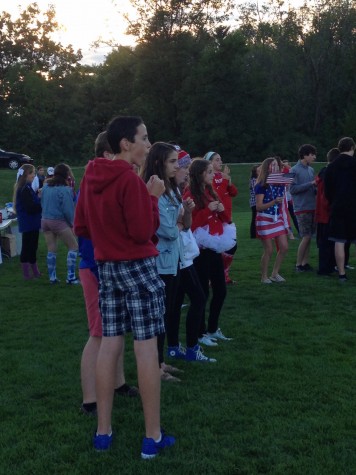 Freshman eagerly watch the Homestead Band warm up just minutes before the football game.