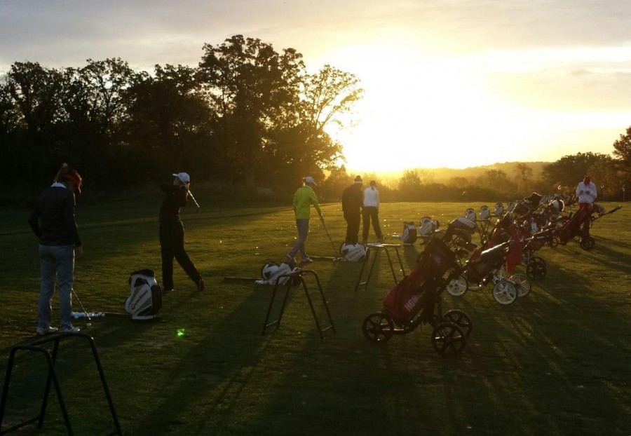 The girls golf team practices before competing in the state tournament on Monday, Oct. 12.
