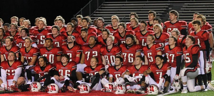 The+boys+football+team+celebrated+the+victory+that+took+them+to+the+semifinal+game+against+Chippewa+Falls%2C+in+which+they+won+27-23%2C+allowing+them+to+advance+onto+state.