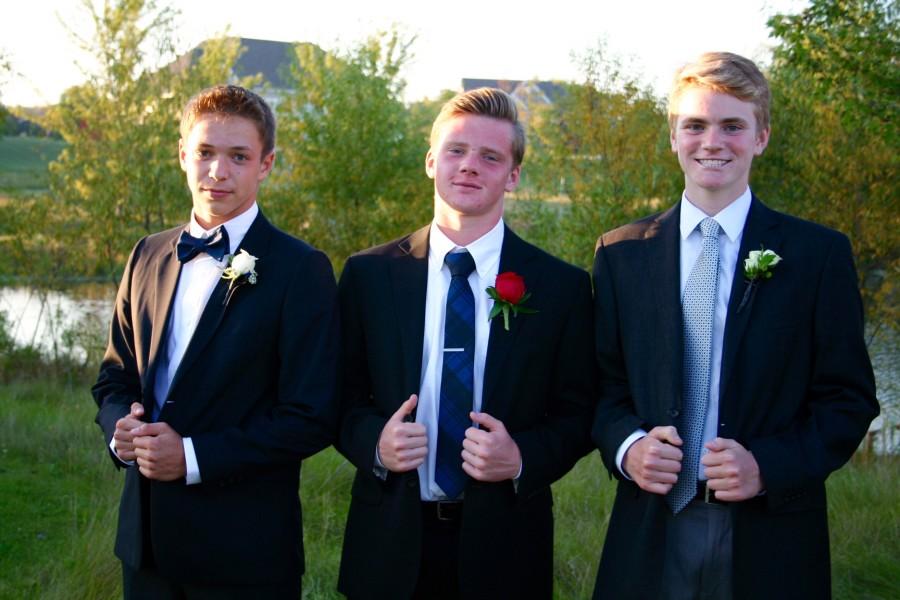 Zach Teplin, Jackson Bogli and Max Kelly, freshmen, pose for a picture at Homecoming.