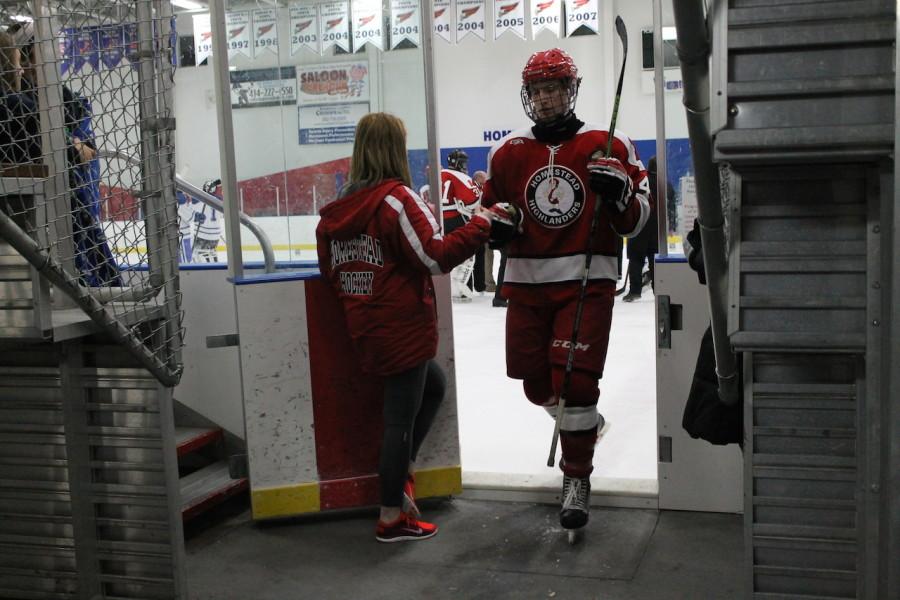 Driscoll, number 4, comes off the ice in between periods in the victory over Brookfield last season.