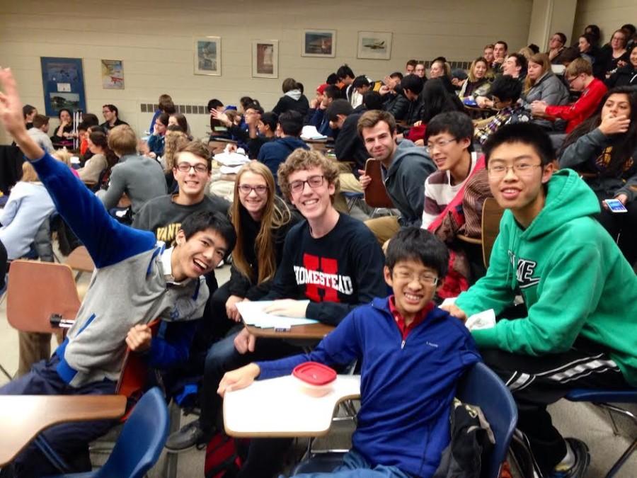 Julian Camacho, freshman, sits with the HHS math team at the MSOE math competition.