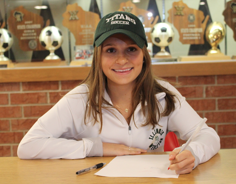 Jordan Ellerbrock, senior, signs a National Letter of Intent to play Division III soccer for Illinois Wesleyan University.