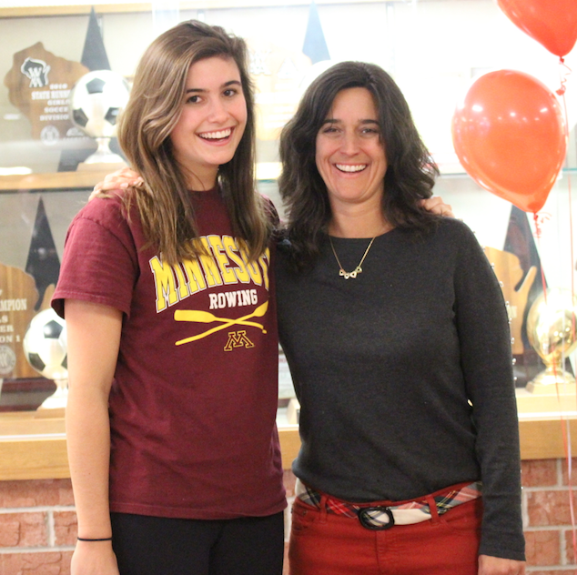Maggie Hadcock, senior, poses with mother Jennifer Hadcock on national signing day in which she committed to row for the University of Minnesota - Twin Cities. 