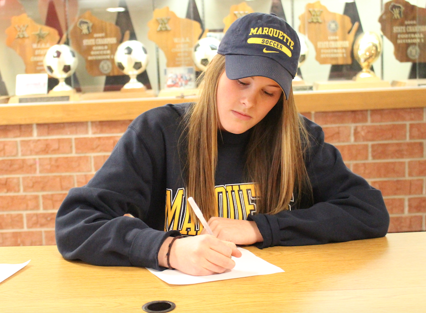 Mary Kate Simon, senior, signs a National Letter of Intent to continue her athletic career playing soccer for Marquette University. 