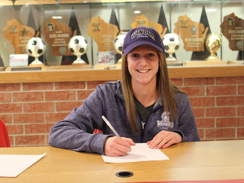 Coco Wiencek, senior, proudly smiles post signing a National Letter of Intent to play Division II soccer at Winona State University. 