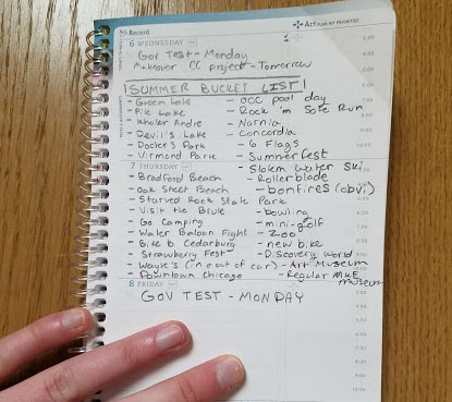 Anna Kornreich utilizes her assignment notebook for her priorities. 