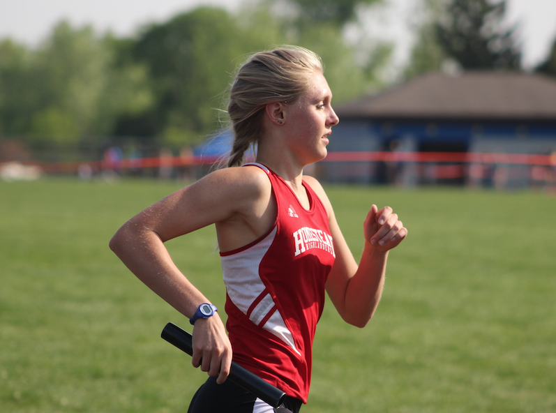 Maddie Powell, senior, runs the final leg of the 4x800-meter relay.