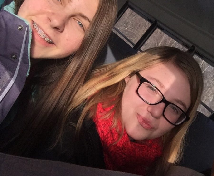 Hildebrand and a friend take a selfie on the bus.