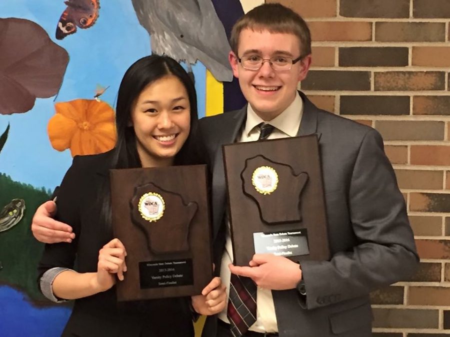 Mitchell+Larson+and+Katie+Cao%2C+juniors%2C+pose+after+this+years+state+debate+tournament.+The+pair+will+compete+at+the+national+debate+tournament+from+June+12+to+17.+The+hardest+part+of+debate+is+the+speed+and+complexity.+There+are+so+many+plans+and+topics+to+discuss%2C+Larson+said.