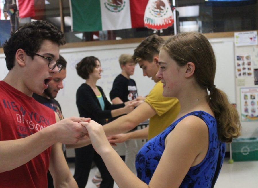 Miranda Grisa and Zach Ginkel, seniors, partner dance the salsa. The salsa is a dance that is mixed with basic steps and saucy turns. It brought a fun and upbeat atmosphere to the class, Luke Grohman, senior, said. 