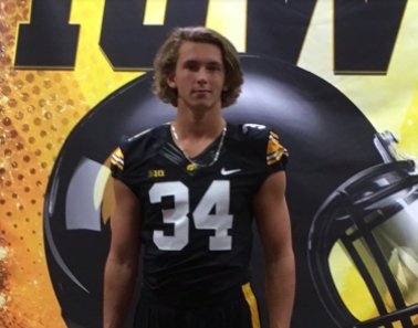 Mike Bruner, junior, commits to University of Iowa to play football.