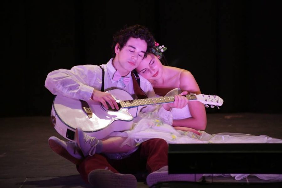 Zach Ginkel, senior, and Sophie Nelson, senior play the part of Orpheus and Eurydice, a couple deeply in love. Photo used with permission from the Homestead Drama Club.