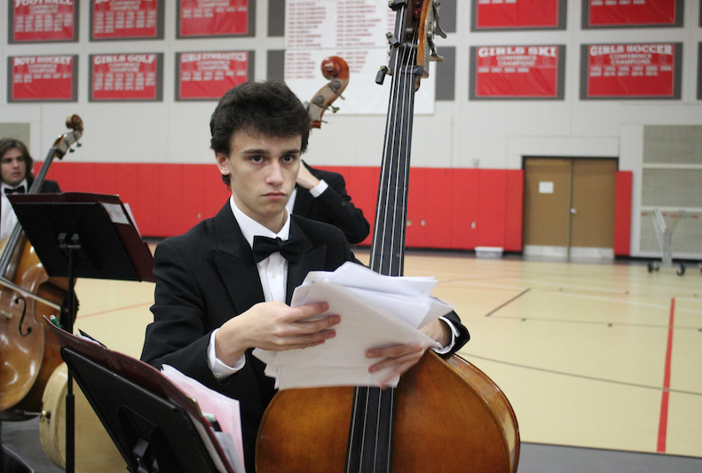 Aaron Rosenberg, senior, performs in the orchestra concert. 