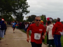 Mr. Sivanich is pictured running a marathon last year.