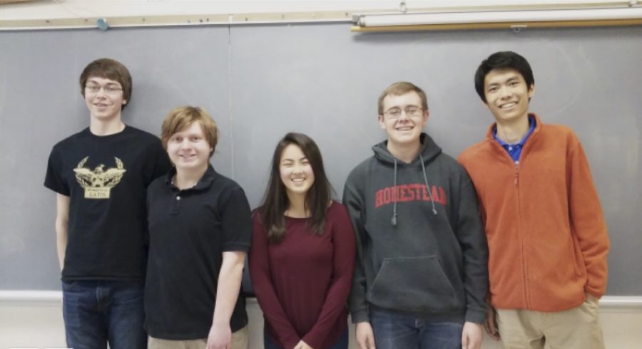 The Moodys Mega Math Challenge Team consisting of Chris Aceto, Stephen Marcon and Rachel Fu, juniors, and Mitchell Larson and Yibo Pan, seniors.
