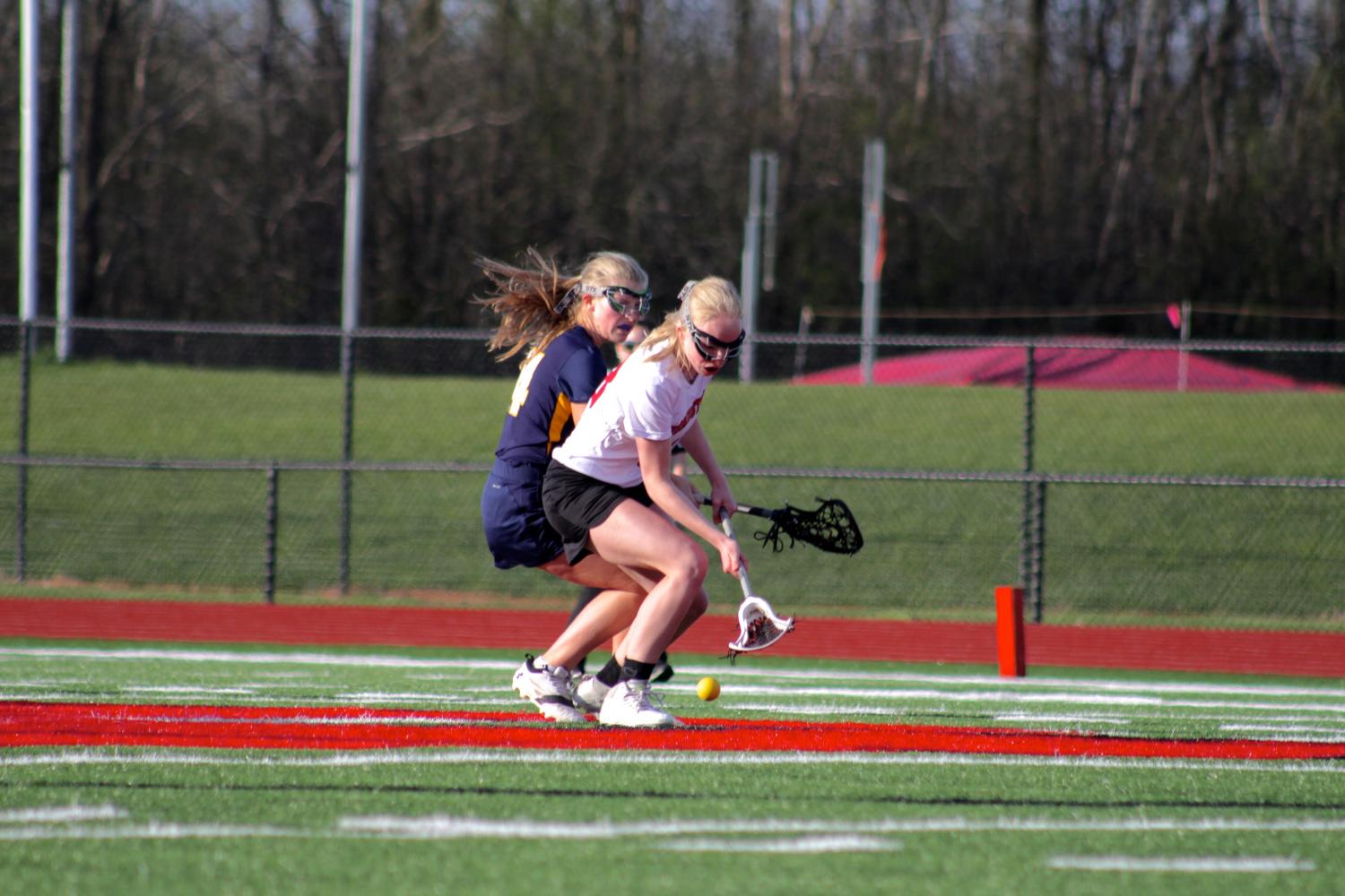 Anna Lalande, sophomore, edges out an opponent for the ball. 