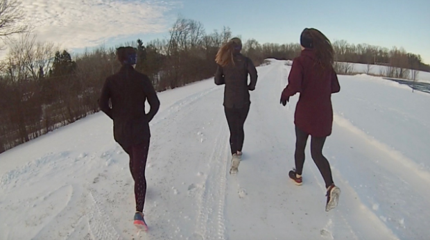 Anna Timme and Anna Nguyen, freshmen, run with Natalie Gauss, junior, in 20-degree weather, which they consider “pretty warm.”