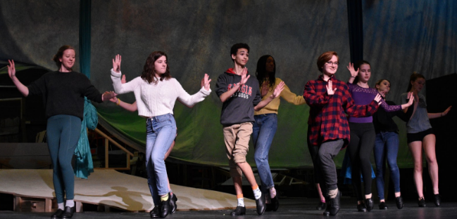 Cast members rehearse a dance routine in preparation for the upcoming winter musical.