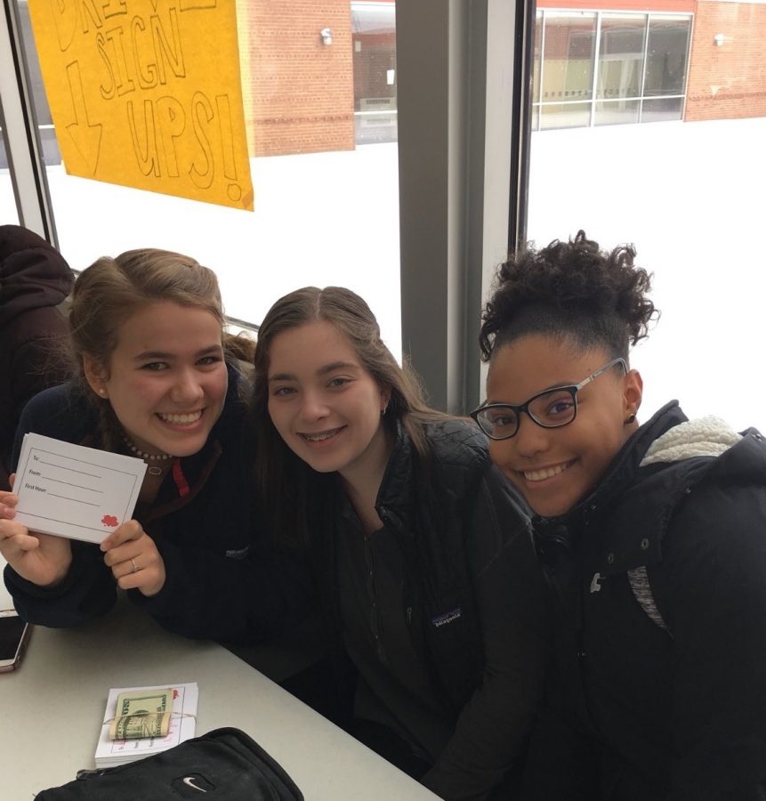 AVID students Molly Plamann, Sydney Kleinerman and Brooke Bell pose for a photo during the sale.