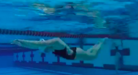 Megan Hartlieb, sophomore, spends time in her second home underwater as she prepares for a future of swimming.