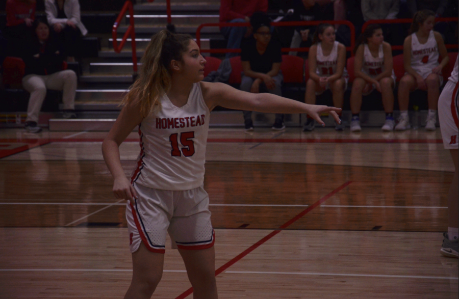 McKenna Marotta, sophomore, directs her teammates during the game.