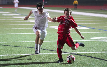 
Sam Walton, freshman, takes his shot at goal playing for Homestead’s varsity soccer team.
