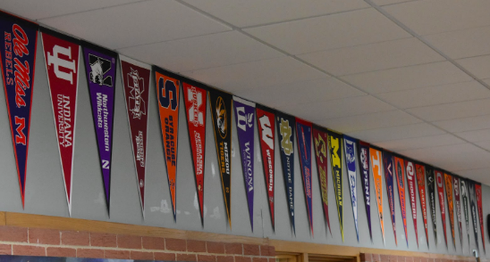 Flags adorning the hallways constantly remind seniors of the importance of college.