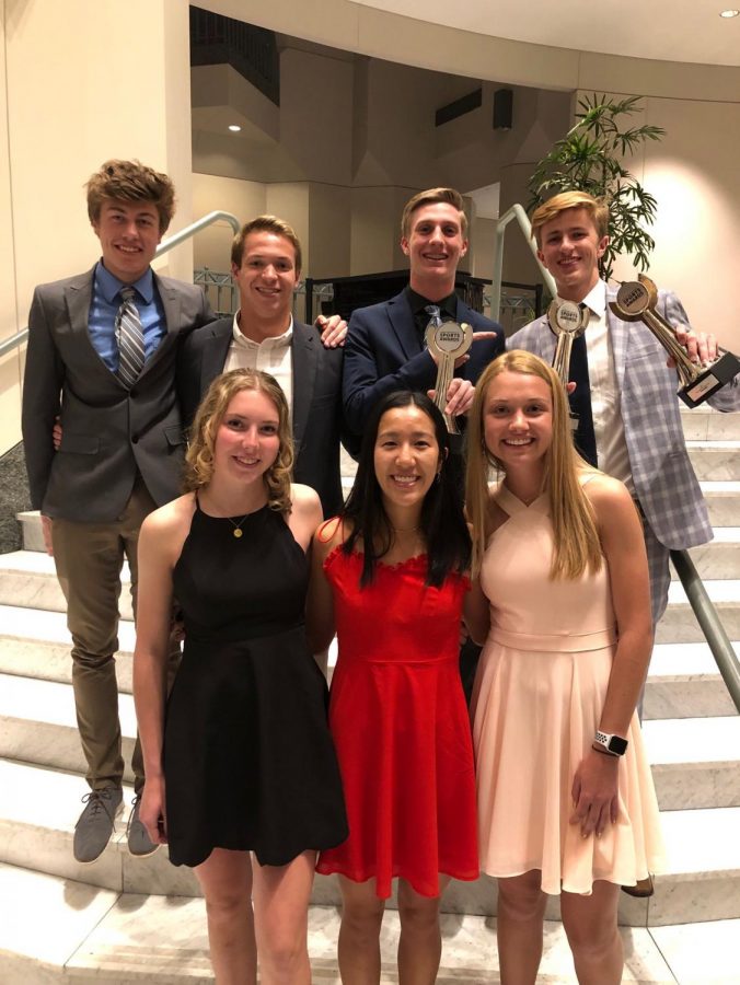 Pierce Stastney, Zach Teplin, Jared Schneider, Drew Bosley, and Paige Weir, seniors, Natalie Yang, junior, and Leane Willemse, sophomore, pose after the awards ceremony. Not pictured Taylor Raskin, junior.