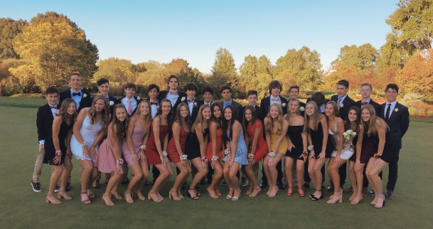 Freshmen+gather+at+dinner+before+coming+to+their+first+Homecoming+dance.+