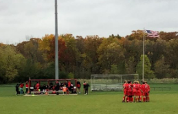 The boys soccer team braved the elements during its first playoff game against Milwaukee Riverside.