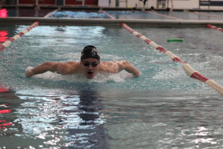 Luke Appazeller, senior, swims butterfly. 