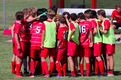 
The Homestead boys varsity soccer team huddle before a big match against Marquette during the 2019 season.
