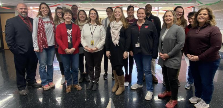 Brenda Hinkens (fourth from right) will retire at the end of the school year after 18 years at Homestead High School. 