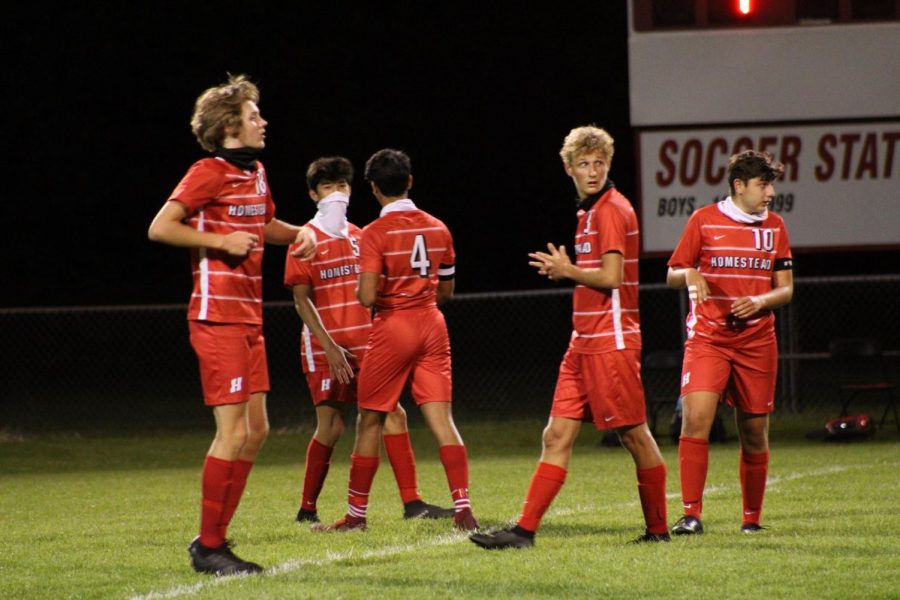 The boys soccer team won their first home game against West Bend East.