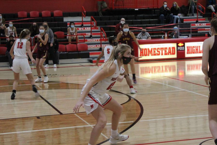 Lexi Buzzell guarding at her last basketball game in the Homestead gym. 